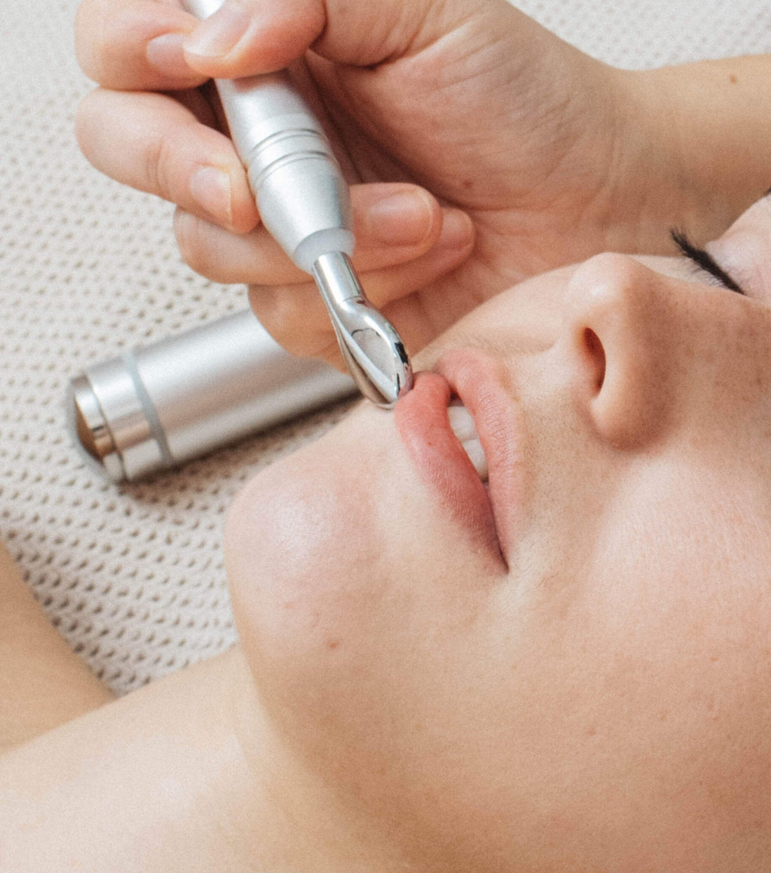 Holistic esthetician performing a customized facial at Shop Good spa in San Diego