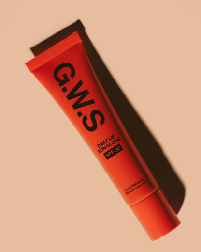 An orange squeeze tube of G.W.