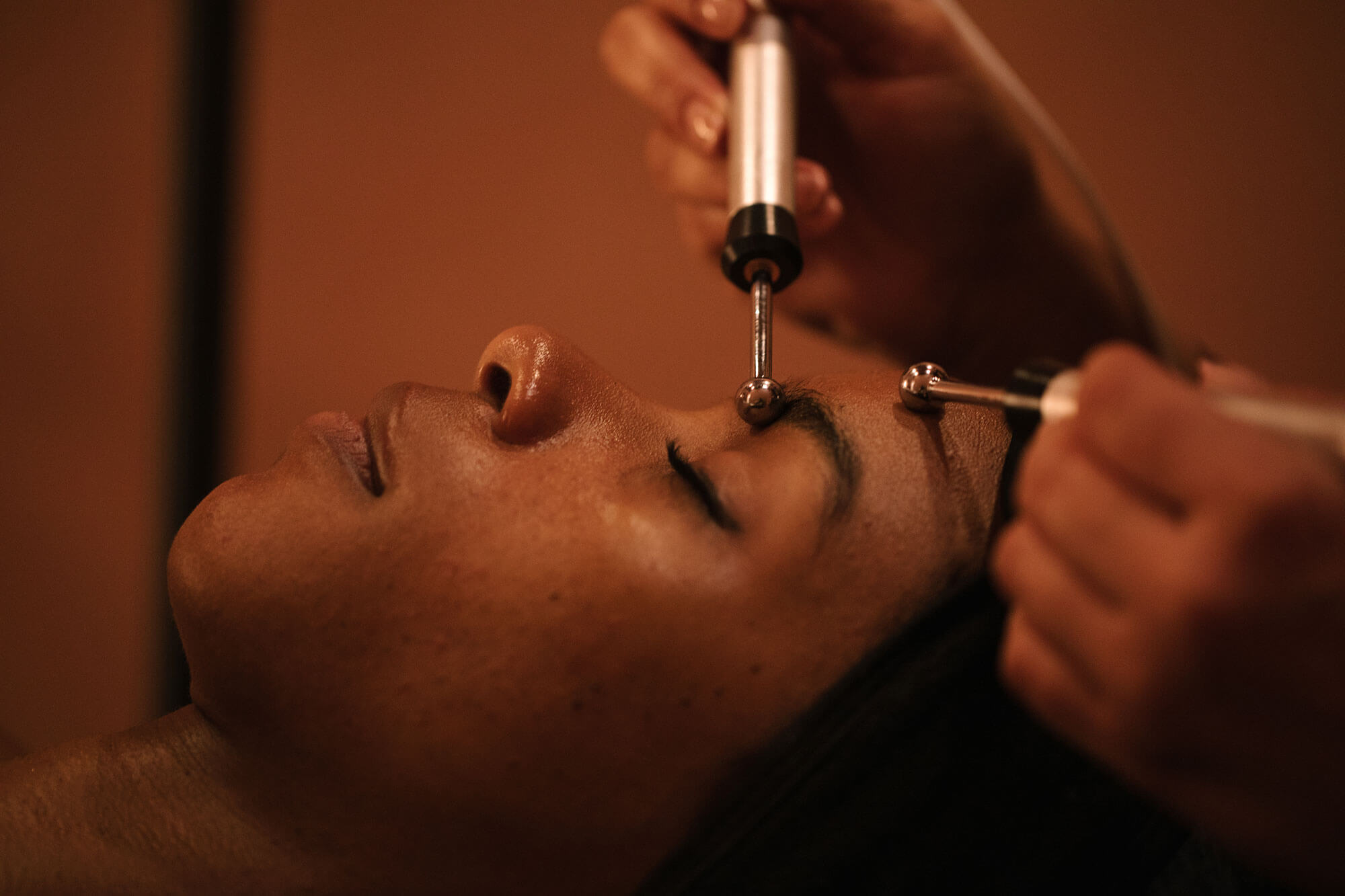 woman getting her brows done at shop good