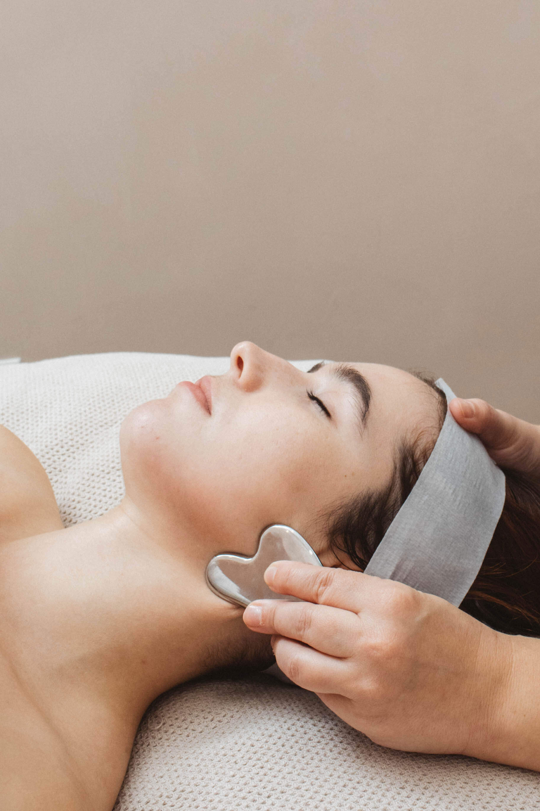 woman getting specialty face massage