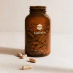 open jar with pills on counter