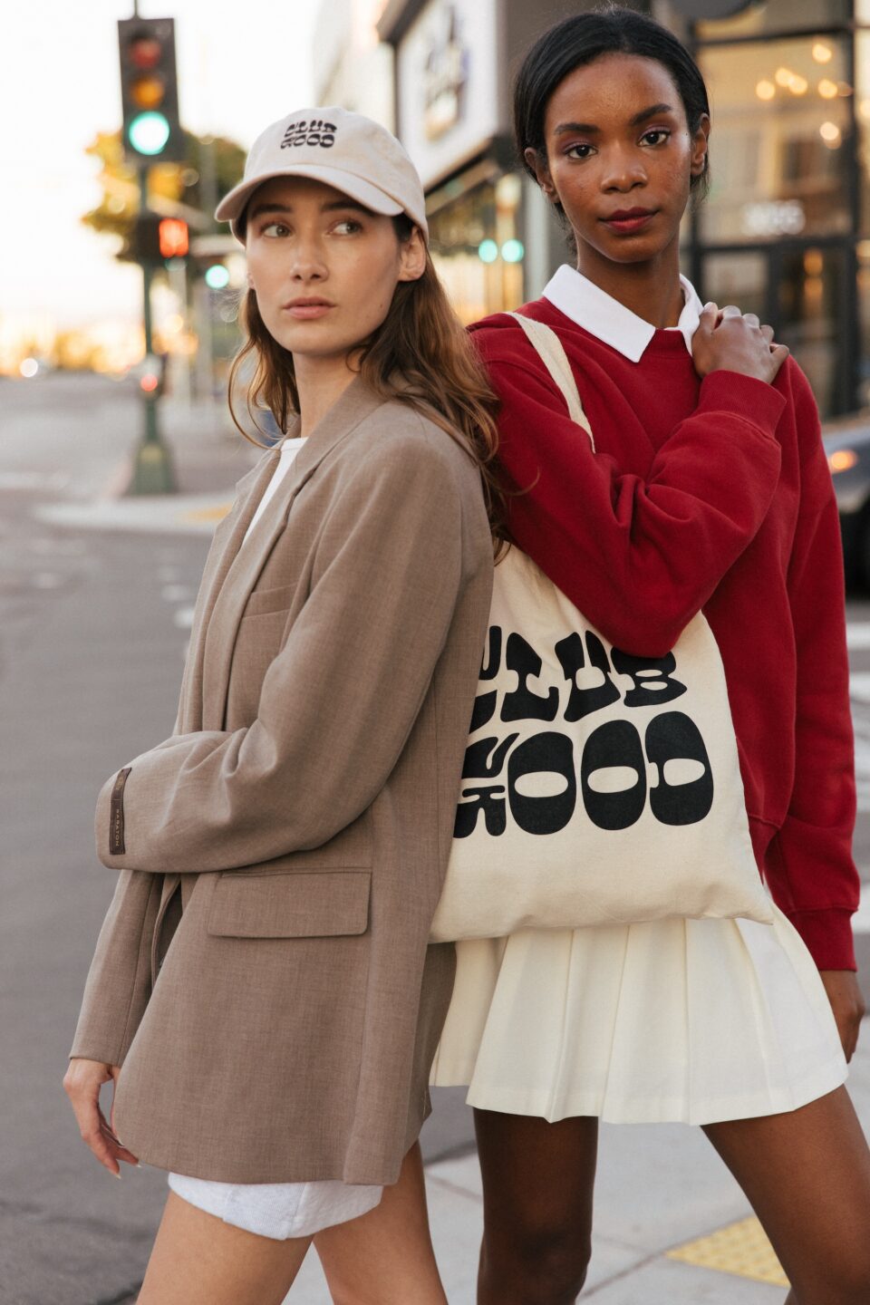 Two Shop Good models standing on the street