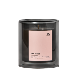 candle with pink label